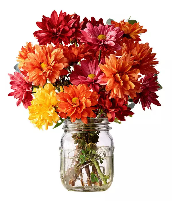 Fall daisies in mason jar